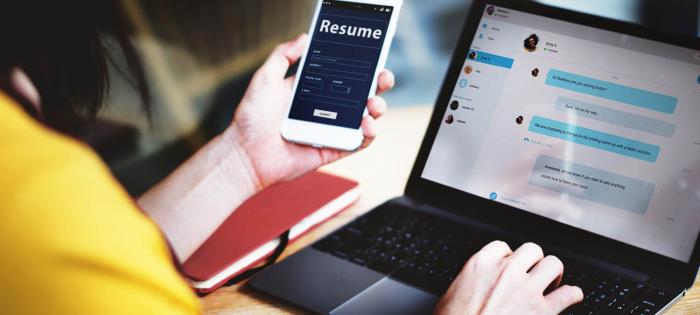 Employee referral applicant using a smartphone and laptop